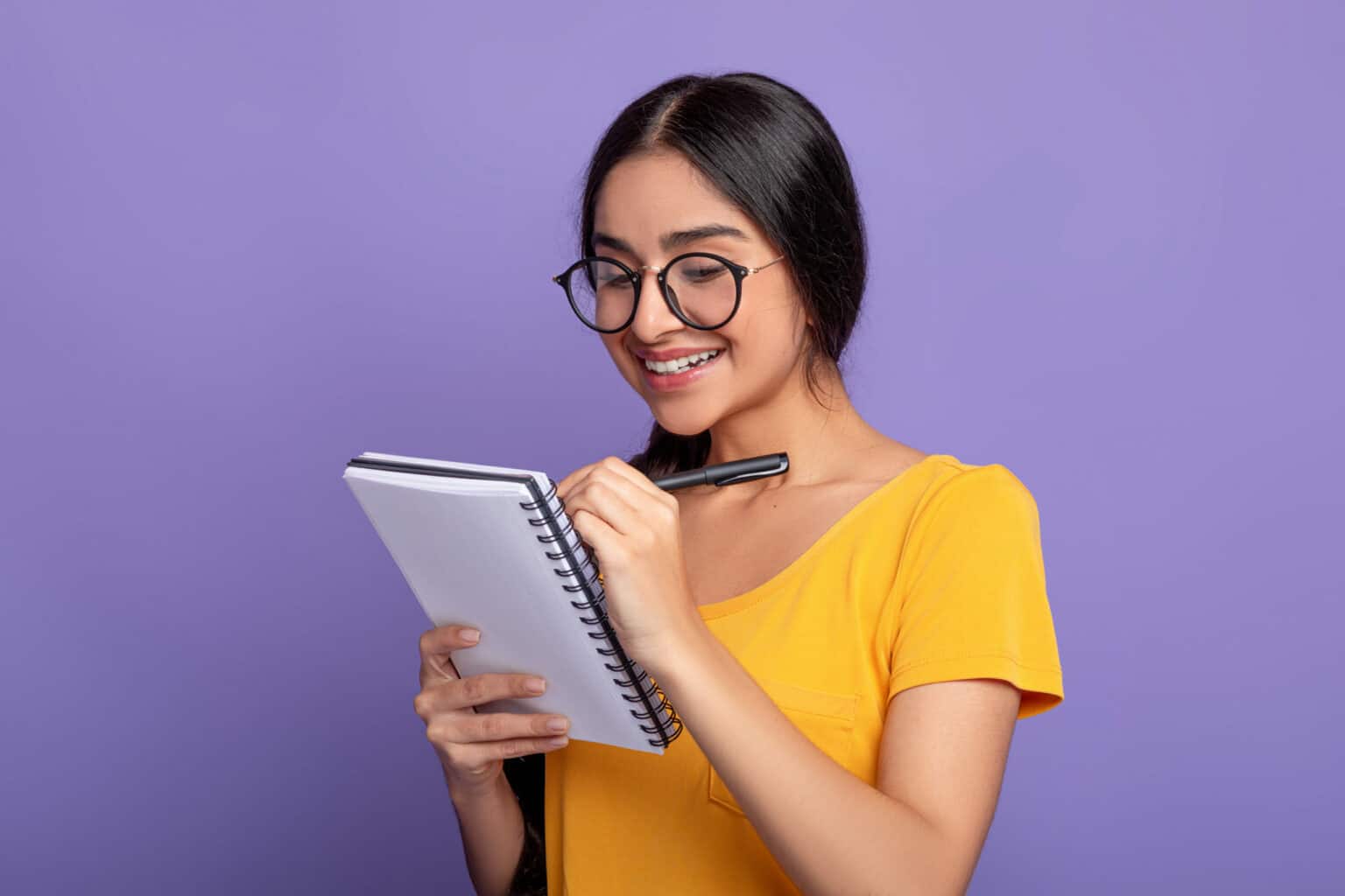Checklist.,Portrait,Of,Intelligent,Indian,Female,Student,Wearing,Glasses,,Taking